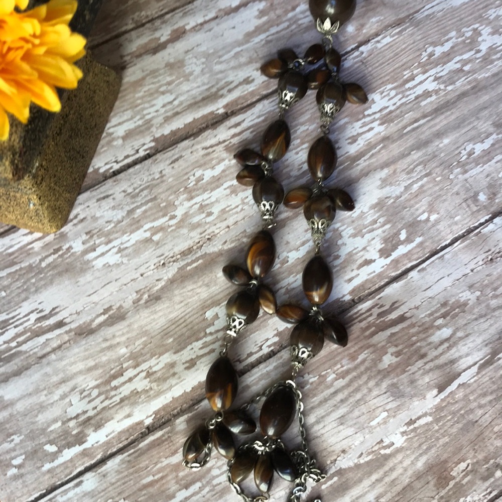 18inch long brown bead necklace.